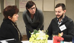 EvalU faculty member Julie Witmer (centre) confers with THEMUSEUM's Marg Byvelds and Brent Wettlaufer.