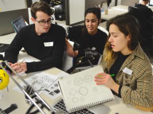 Conestoga College design students (from left) Zac Spurling, April Bennett and Jessica Spencer work on branding concepts at CreateAthon Waterloo-Wellington for Fort McMurray 2016.